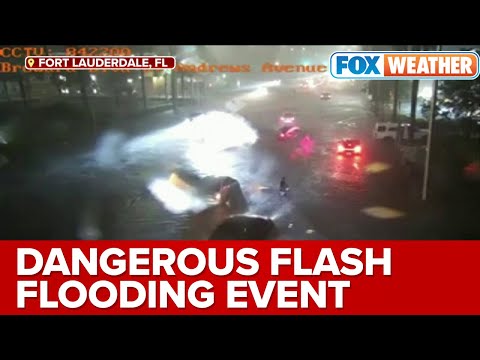 Vehicles Stuck on Flooded Road in Fort Lauderdale, FL During Flood Emergency