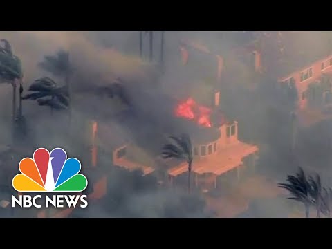 Homes Burn In Fast Moving Southern California Brush Fire